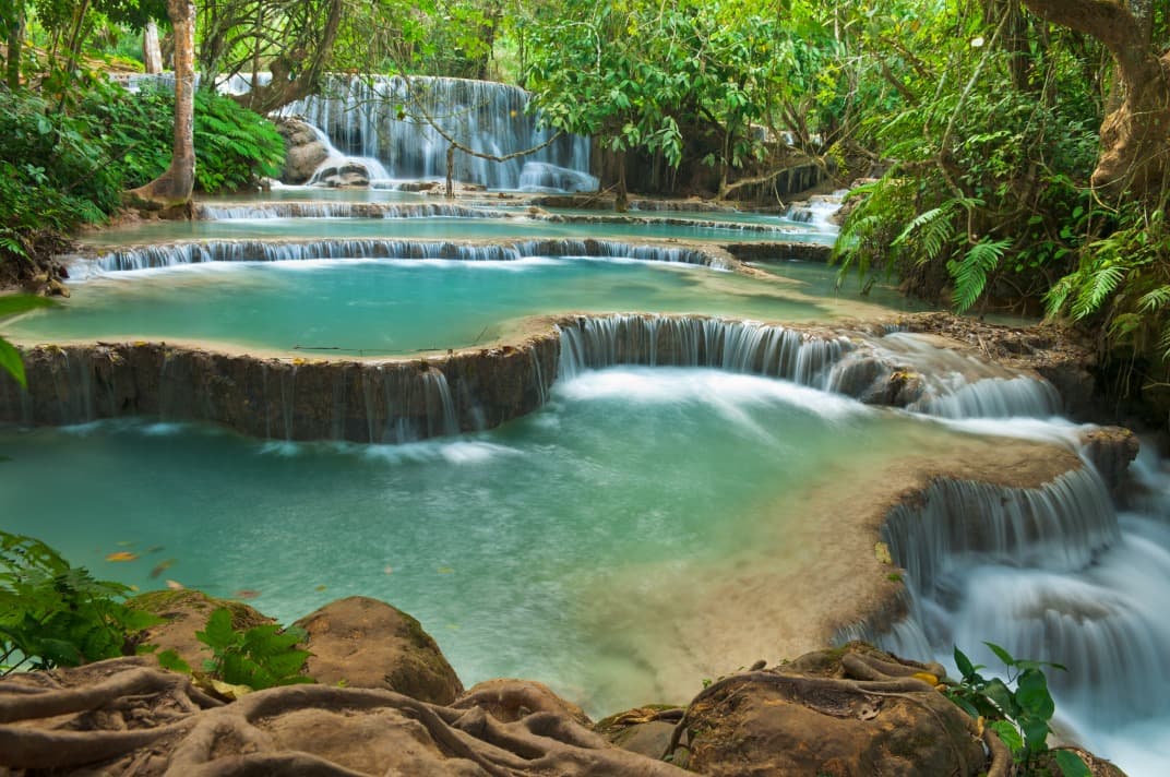 What are the must-see attractions around Luang Prabang?